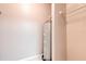 Laundry room includes water heater and tile flooring at 13304 Sanctuary Cove Dr # 303, Temple Terrace, FL 33637