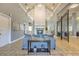 Open-concept living room with high ceilings, fireplace, and tiled floors is perfect for entertaining at 13304 Sanctuary Cove Dr # 303, Temple Terrace, FL 33637