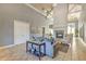 Open-concept living room with high ceilings, fireplace, and tiled floors is perfect for entertaining at 13304 Sanctuary Cove Dr # 303, Temple Terrace, FL 33637