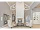 Welcoming lobby features a soaring fireplace, creating a luxurious first impression at 13304 Sanctuary Cove Dr # 303, Temple Terrace, FL 33637