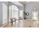 Bright lounge area with lots of natural light and features a large arched window at 13304 Sanctuary Cove Dr # 303, Temple Terrace, FL 33637