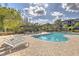 Resort-style pool with lounge chairs and cabana, perfect for relaxation and community gatherings at 13304 Sanctuary Cove Dr # 303, Temple Terrace, FL 33637