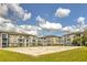 Enjoy outdoor fun with a sand volleyball court against a backdrop of well-maintained apartment buildings at 13304 Sanctuary Cove Dr # 303, Temple Terrace, FL 33637