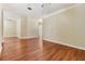 Bright living room showcases wood floors, neutral tones, and open layout at 10024 Bucklin St, Tampa, FL 33625