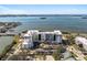 Beautiful bird's eye view of the condo building and its location on the bayfront at 1020 Sunset Point Rd # 510, Clearwater, FL 33755