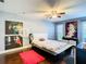 Charming main bedroom with modern furnishings, unique decor, and a ceiling fan at 110 Aspen Cir, Seminole, FL 33777