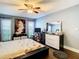 Serene main bedroom features modern decor, dresser, and natural light at 110 Aspen Cir, Seminole, FL 33777