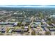 Lush aerial landscape with a variety of residential apartments, trees, and community pools at 1142 84Th N Ter # C, St Petersburg, FL 33702
