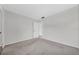 Empty bedroom featuring carpet, a closet, and neutral walls at 1142 84Th N Ter # C, St Petersburg, FL 33702