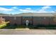 Apartment building showing classic brick facade and manicured landscaping at 1142 84Th N Ter # C, St Petersburg, FL 33702