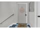 Bright entryway featuring a welcome mat, decorative door sign, and clean modern finishes at 1142 84Th N Ter # C, St Petersburg, FL 33702