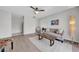 Inviting living area featuring wood-look floors and comfortable seating. Great natural light at 1142 84Th N Ter # C, St Petersburg, FL 33702