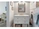 Elegant bathroom featuring a vanity and large mirror at 1213 Bay Club Cir, Tampa, FL 33607
