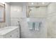 Stylish bathroom with marble vanity and walk-in shower featuring a rainfall showerhead at 1213 Bay Club Cir, Tampa, FL 33607