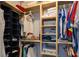 Well-organized walk-in closet with ample shelving and hanging space for clothes and accessories at 1213 Bay Club Cir, Tampa, FL 33607