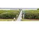 Wooden walkway leading to the community fishing dock at 1213 Bay Club Cir, Tampa, FL 33607