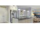 Bright, modern kitchen featuring stainless steel appliances and an eat-in center island at 1213 Bay Club Cir, Tampa, FL 33607
