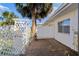A private patio surrounded by a privacy fence with a view of a mature palm tree at 1517 Danbury Dr, Sun City Center, FL 33573
