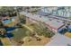 A beautiful condo community with a central pond, pool and covered parking at 1750 Belleair Forest Dr # A7, Belleair, FL 33756