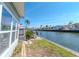 Backyard with waterfront views and a small patio area at 18675 Us Highway 19 N # 251, Clearwater, FL 33764