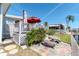 Back deck with stone patio area at 18675 Us Highway 19 N # 251, Clearwater, FL 33764