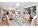 Bright dining room featuring an open layout into the living room and kitchen at 18675 Us Highway 19 N # 251, Clearwater, FL 33764
