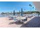 Inviting pool deck with comfortable lounge chairs and tables, perfect for outdoor relaxation at 18675 Us Highway 19 N # 251, Clearwater, FL 33764