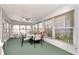 Sunroom with a ceiling fan and river views at 18675 Us Highway 19 N # 251, Clearwater, FL 33764