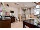 Traditional bathroom featuring dual sinks, a separate tub, shower and vanity with vanity lighting at 2100 Mcmullen Rd, Largo, FL 33771
