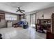 Versatile bonus room featuring tile floors, bright lighting, and patio access, perfect for customization and relaxation at 2100 Mcmullen Rd, Largo, FL 33771