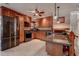 Large kitchen featuring stainless appliances, granite countertops and custom wood cabinets at 2100 Mcmullen Rd, Largo, FL 33771