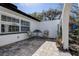 Intimate patio featuring a stone paver surface and seating at 2100 Mcmullen Rd, Largo, FL 33771