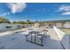 Outdoor picnic area with ample seating near community amenities at 250 Rosery Nw Rd # 329, Largo, FL 33770