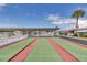 Active community shuffleboard courts with covered seating areas, perfect for friendly competition at 250 Rosery Nw Rd # 329, Largo, FL 33770