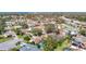 Neighborhood aerial view showcasing the home, landscaping, and pool at 2725 Onizuka Ct, Palm Harbor, FL 34683
