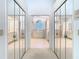 Bathroom with mirrored closets at 2725 Onizuka Ct, Palm Harbor, FL 34683