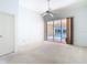 Bedroom with sliding glass door to screened pool at 2725 Onizuka Ct, Palm Harbor, FL 34683