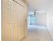 Neutral bedroom with a ceiling fan, closet and natural light at 2725 Onizuka Ct, Palm Harbor, FL 34683