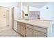 Kitchen featuring ample cabinetry and counter space, and a breakfast bar at 2725 Onizuka Ct, Palm Harbor, FL 34683