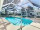 Enjoy the crystal clear pool of this home at 2725 Onizuka Ct, Palm Harbor, FL 34683