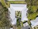 Aerial view of the property showcasing the roof and surrounding greenery at 2757 Countryside Blvd # 103, Clearwater, FL 33761