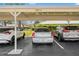 Covered carport with assigned parking spots for residents at 2757 Countryside Blvd # 103, Clearwater, FL 33761