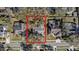 Aerial view of a residential lot in a neighborhood with tree coverage near other homes at 3013 Ridgevale Cir, Valrico, FL 33596