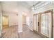 Inviting foyer showcasing stylish light fixtures and seamless flooring, leading to spacious living areas at 3013 Ridgevale Cir, Valrico, FL 33596