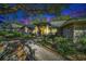 Charming single-story brick home with lush landscaping, walkway and mature trees in a well-manicured yard at 3013 Ridgevale Cir, Valrico, FL 33596