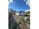 Large backyard with a grill, utility equipment, new fence, and potential for customization at 3623 N 53Rd St, Tampa, FL 33619