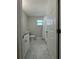 Bathroom featuring a white toilet, shower with curtain, and a white vanity with a granite countertop at 3623 N 53Rd St, Tampa, FL 33619