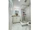 Bathroom with a shower featuring a shower curtain, and white marble floors and vanity at 3623 N 53Rd St, Tampa, FL 33619