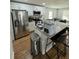 Modern kitchen with stainless steel appliances and granite countertops at 3623 N 53Rd St, Tampa, FL 33619