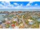 Beautiful aerial view of coastal neighborhood, featuring waterfront access, nearby beach, and a vibrant community at 411 Virginia Ave, Madeira Beach, FL 33708